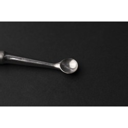   An olive Spoon (Stainless Steel) size 0